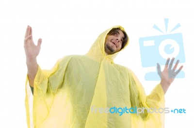 Man Wearing Raincoat And Looking Upward Stock Photo