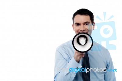 Man With A Megaphone Isolated On White Stock Photo