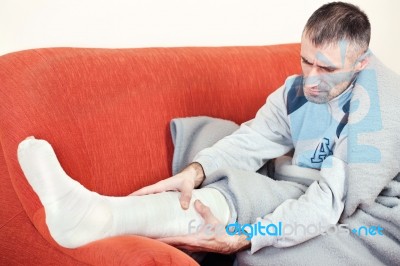 Man With Broken Leg Stock Photo