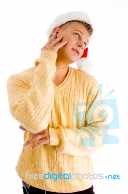 Man With Christmas Hat And Looking Upward Stock Photo