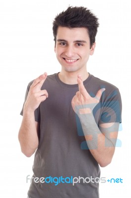 Man With Crossed Fingers Stock Photo