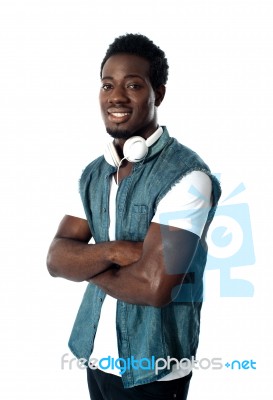 Man With Headphones Around His Neck Stock Photo