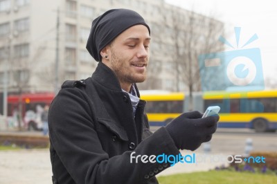 Man With Mobile Phone Traveling Stock Photo