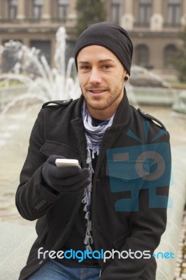 Man With Mobile Phone Traveling Stock Photo