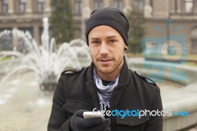 Man With Mobile Phone Traveling Stock Photo