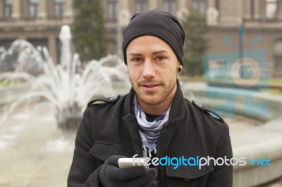 Man With Mobile Phone Traveling Stock Photo