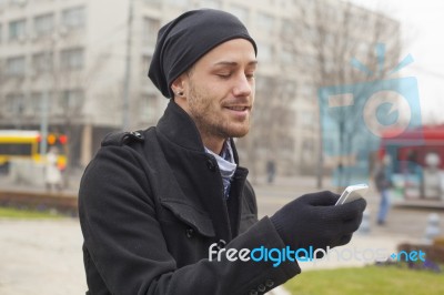 Man With Mobile Phone Traveling Stock Photo