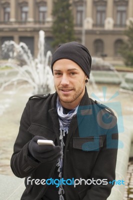 Man With Mobile Phone Traveling Stock Photo