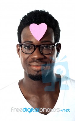 Man With Paper Heart On Forehead Stock Photo