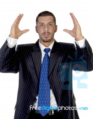 Man With Raised Hands Stock Photo