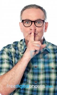 Man with silent gesture Stock Photo