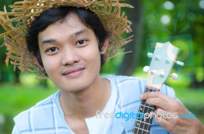 Man With Ukulele Stock Photo