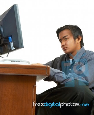 Man Working On Computer Stock Photo