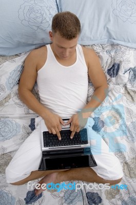 Man Working On Laptop Stock Photo