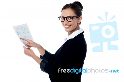 Manager Reviewing Business Document Stock Photo