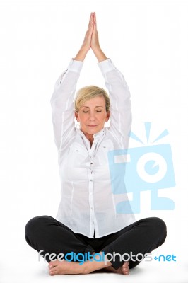 Manager Woman Doing Yoga At White Background Stock Photo