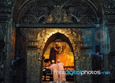 Mandalay, Myanmar- October 9:the Senior Monk Spray Water To Budd… Stock Photo