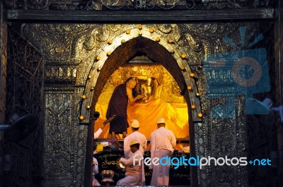 Mandalay, Myanmar- October 9:the Senior Monk Spray Water To Budd… Stock Photo