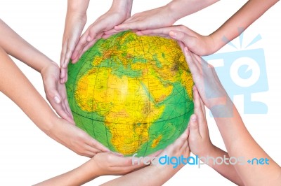 Many Arms Of Children With Hands Holding Globe Stock Photo