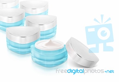 Many Blue Triangle Cosmetic Jar On White Background Stock Photo