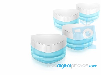 Many Blue Triangle Cosmetic Jar On White Background Stock Photo