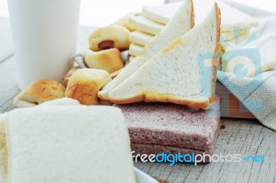 Many Breads And Coffee On Wooden Stock Photo