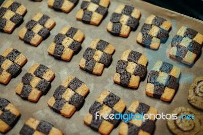 Many Checker Cookie On The Tray Stock Photo