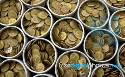 Many Coin Lined In Silver Bowl Stock Photo