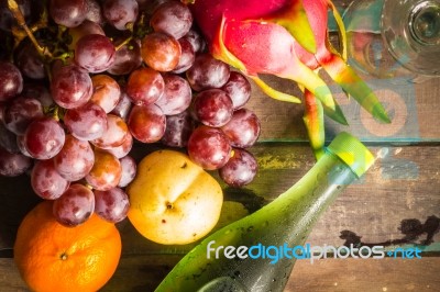 Many Fruits On A Wooden Stock Photo