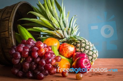 Many Fruits On Wooden Stock Photo