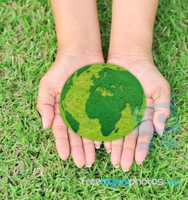 Map Of World In Hands Stock Photo