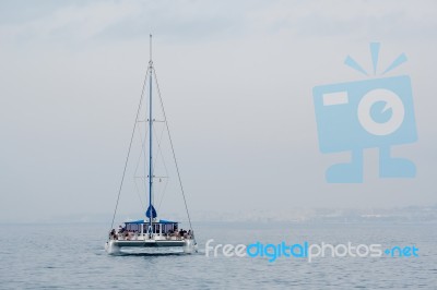 Marbella, Andalucia/spain - July 6 : Catamaran Entering The Harb… Stock Photo