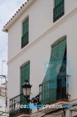 Marbella, Andalucia/spain - July 6 : Green Blinds Over Balconies… Stock Photo