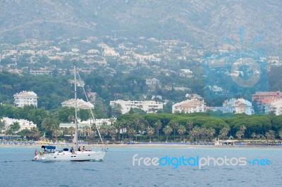 Marbella, Andalucia/spain - July 6 : Yacht Approaching The Harbo… Stock Photo