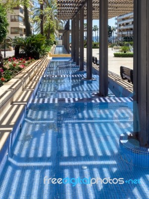 Marbella, Andalucia/spain - May 4 : Blue Pool At Avienda Del Mar… Stock Photo