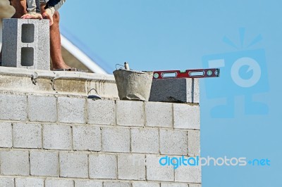 Mason On Laying Bricks Stock Photo