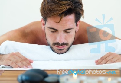 Masseur Doing Massage On Man Body In The Spa Salon Stock Photo