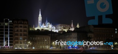 Matthias Church Illuminated At Night In Budapest Stock Photo