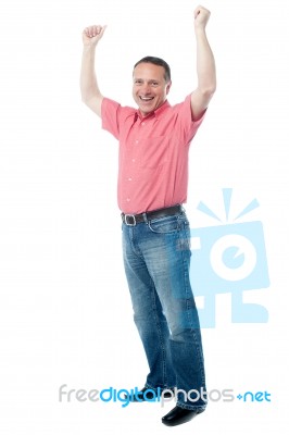 Mature Gentleman With Raised Arms Stock Photo