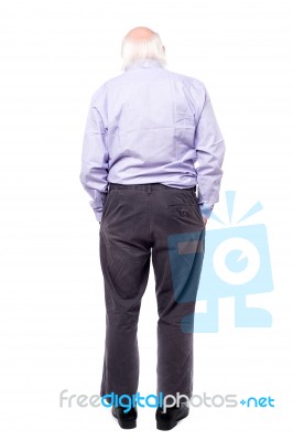 Mature Man Facing The Wall Stock Photo