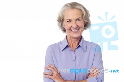 Mature Woman With Folded Arms Stock Photo