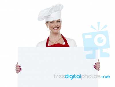 Matured Cook Holding Blank Board Stock Photo