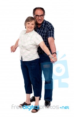 Matured Couple Standing On White Stock Photo