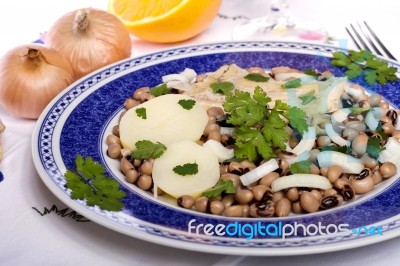 Meal With Beans And Cod Stock Photo