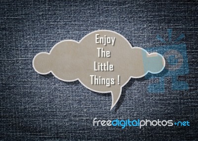 Meaningful Quote On Paper Cloud With Denim Background Stock Photo