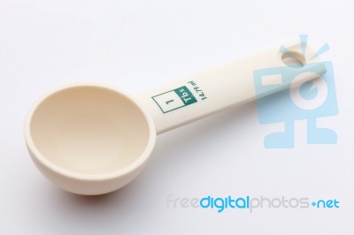 Measuring Spoon On White Background Stock Photo