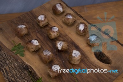 Meatballs On Wooden Cutting Board Stock Photo