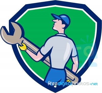 Mechanic Carrying Giant Spanner Crest Cartoon Stock Image