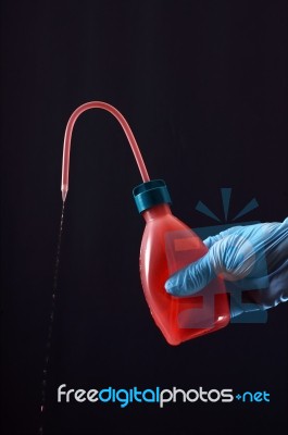 Medical Bottle And Hand  Stock Photo