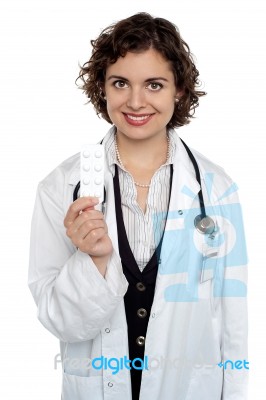 Medical Expert Holding Medicine Strip Stock Photo